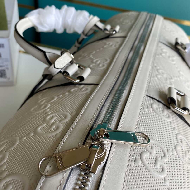 G*u*i gg embossed duffle bag white