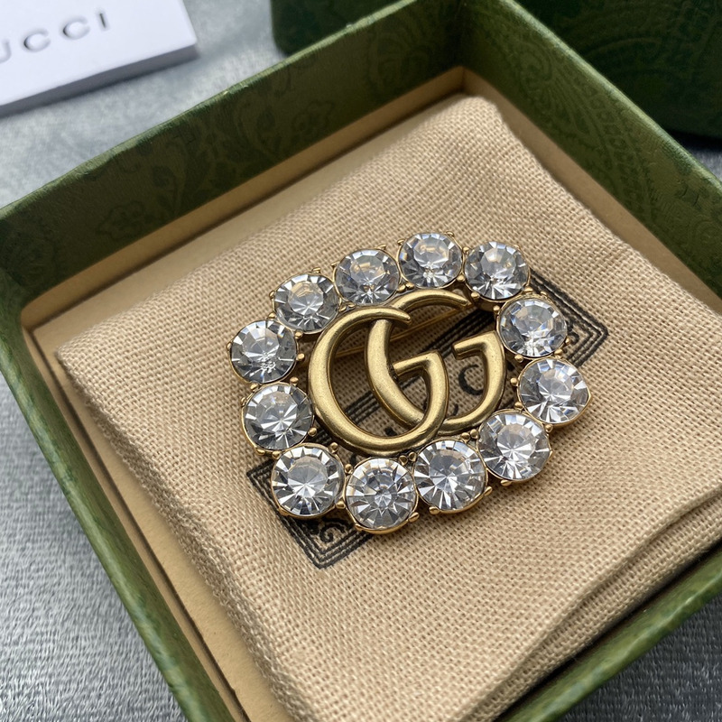 G*u*i metal double g brooch with crystals