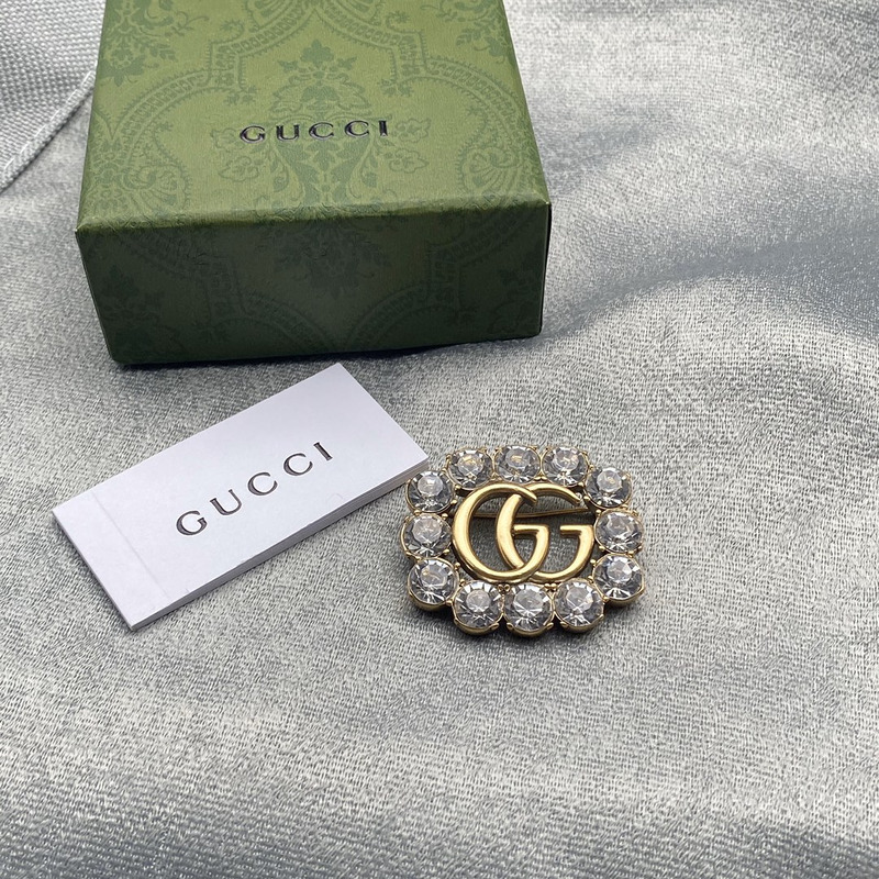 G*u*i metal double g brooch with crystals