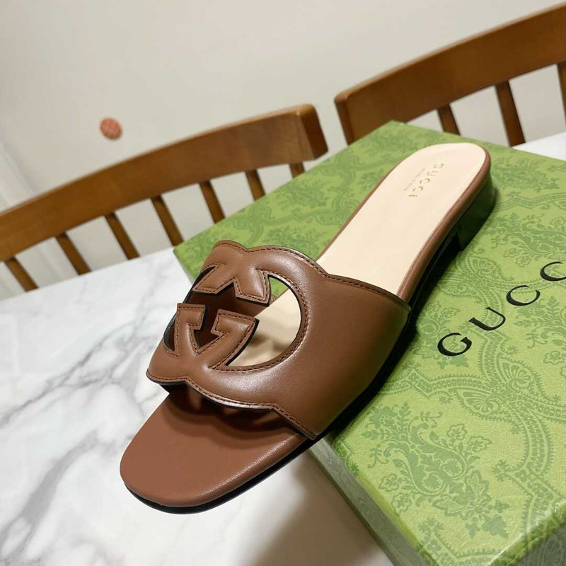 G*u*i women`s interlocking g cut-out slides sandal