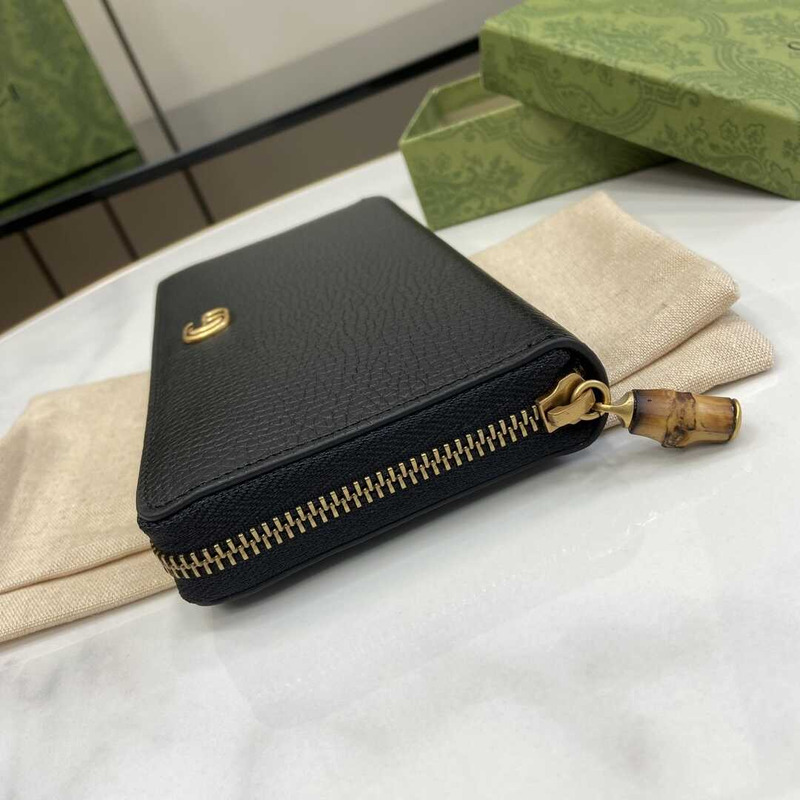 G*u*i portafoglio con cernlera in pelle wallet