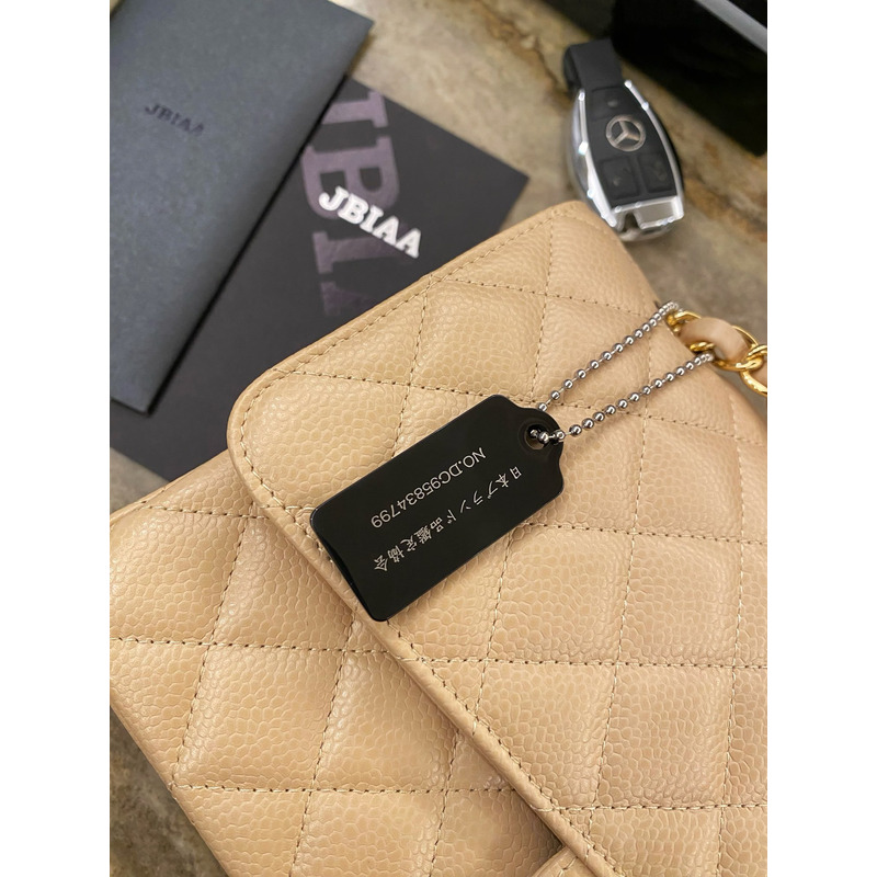 Ch*el large classic caviar handbag beige