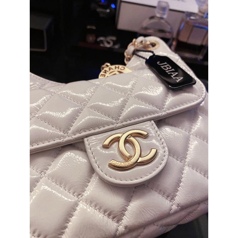 Ch*el shiny crumpled calfskin & gold-tone metal pink