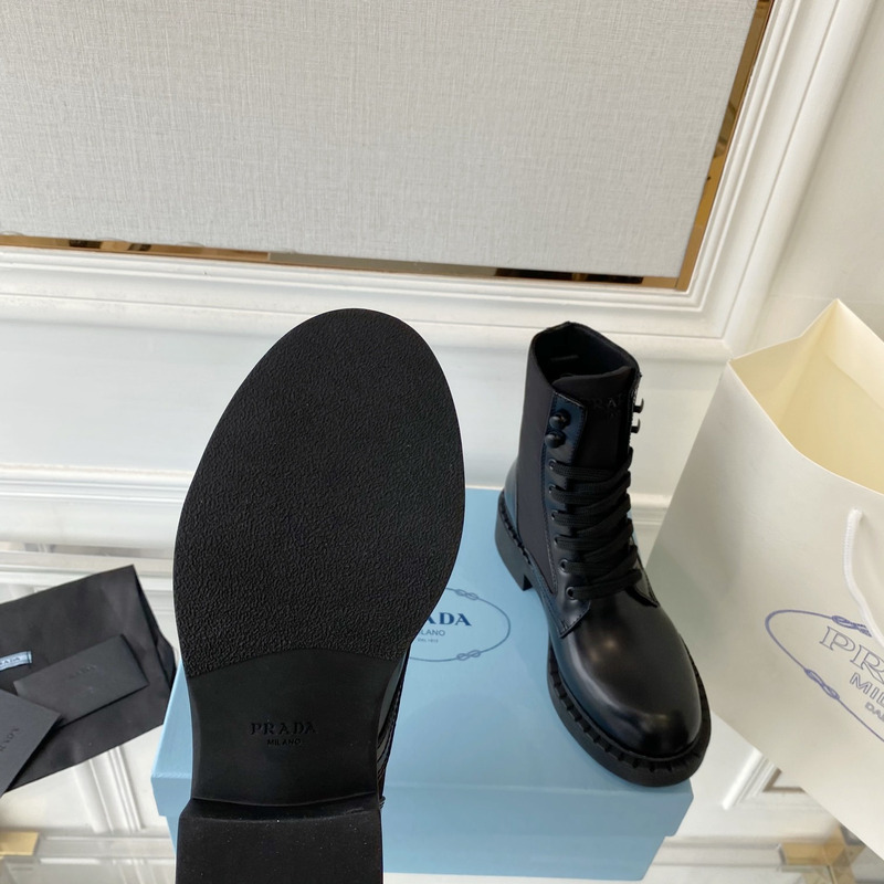 Pra*a brushed-leather and re-nylon boots black