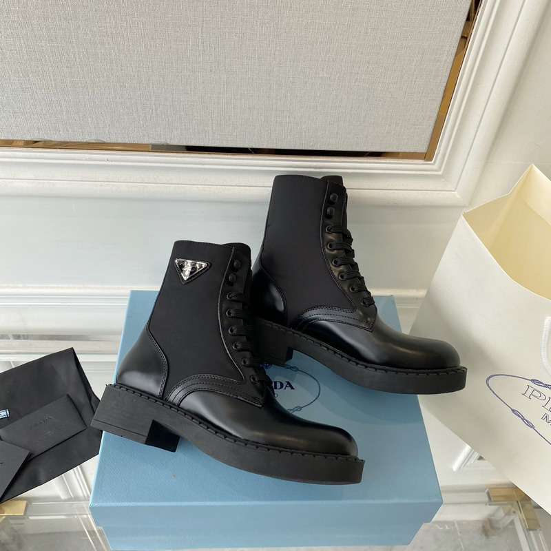 Pra*a brushed-leather and re-nylon boots black