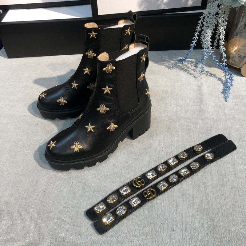 G*u*i embroidered leather ankle boot with belt
