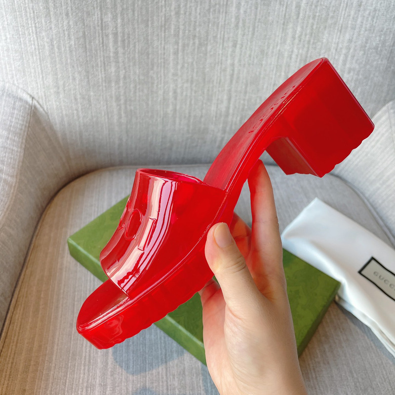 G*u*i plastique logo-embossed rubber mules