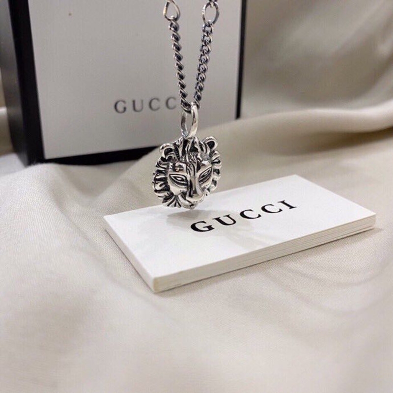 G*u*i 925 sterling silver lion head pendant