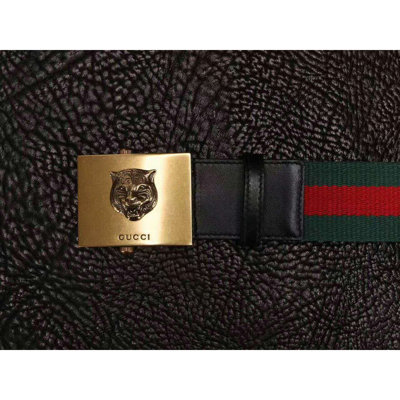 G*u*i canvas web green belt with feline head