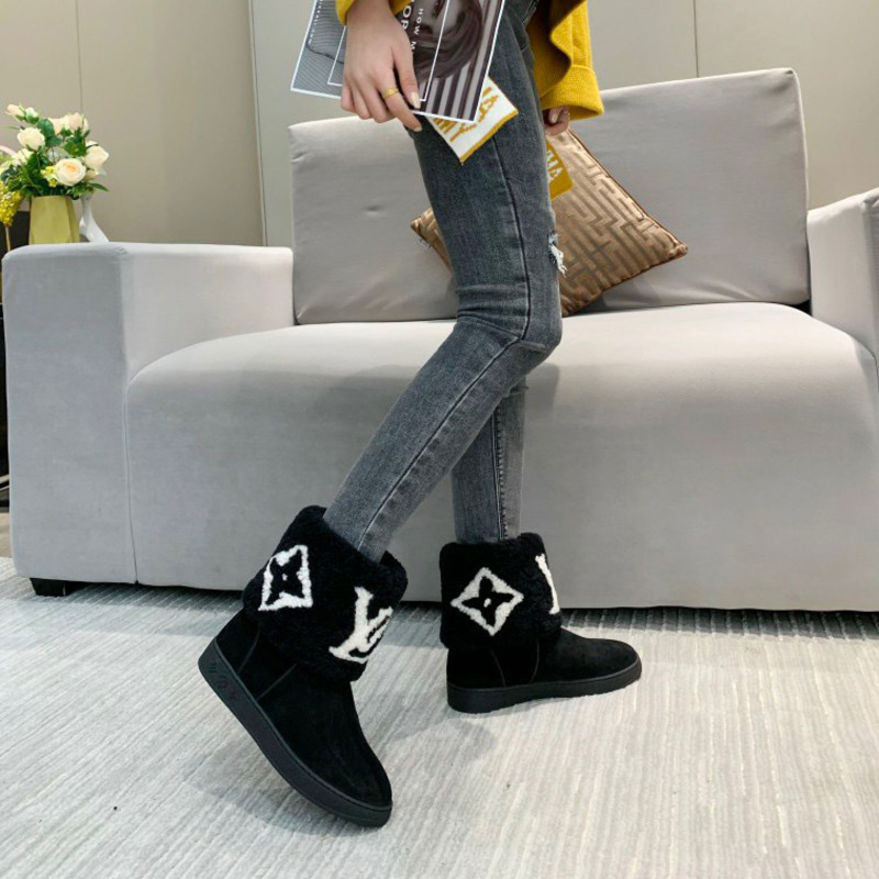 l**is V*t*n monogram black cotton boots