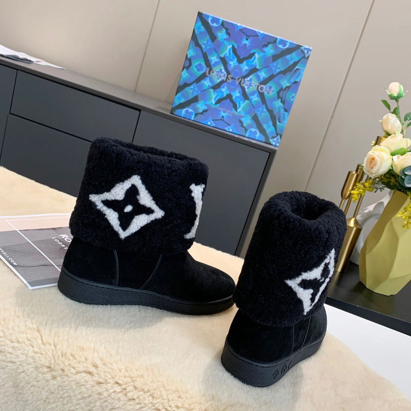 l**is V*t*n monogram black cotton boots